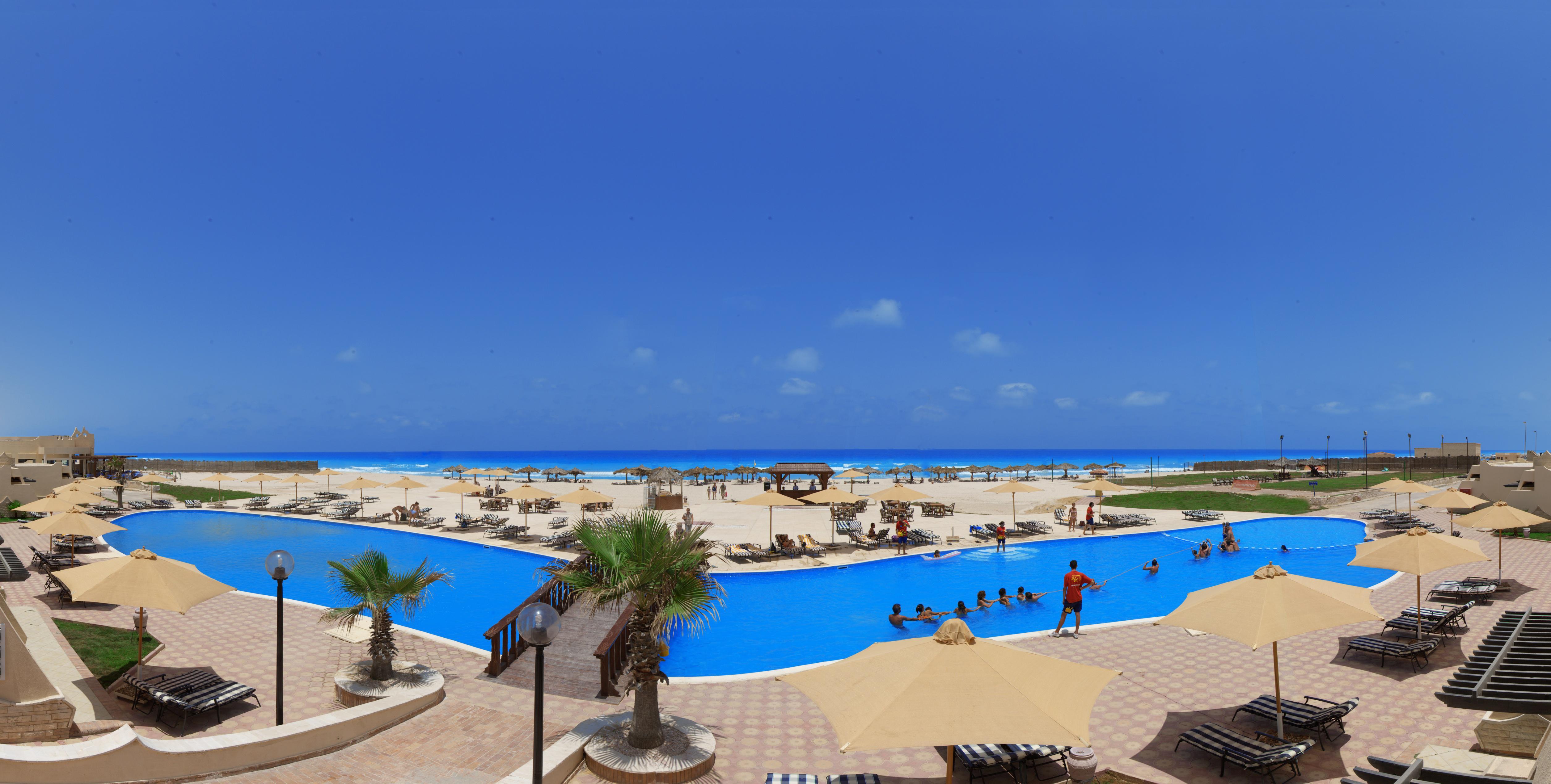 Borg El Arab Beach Resort Exterior foto The beach at the resort
