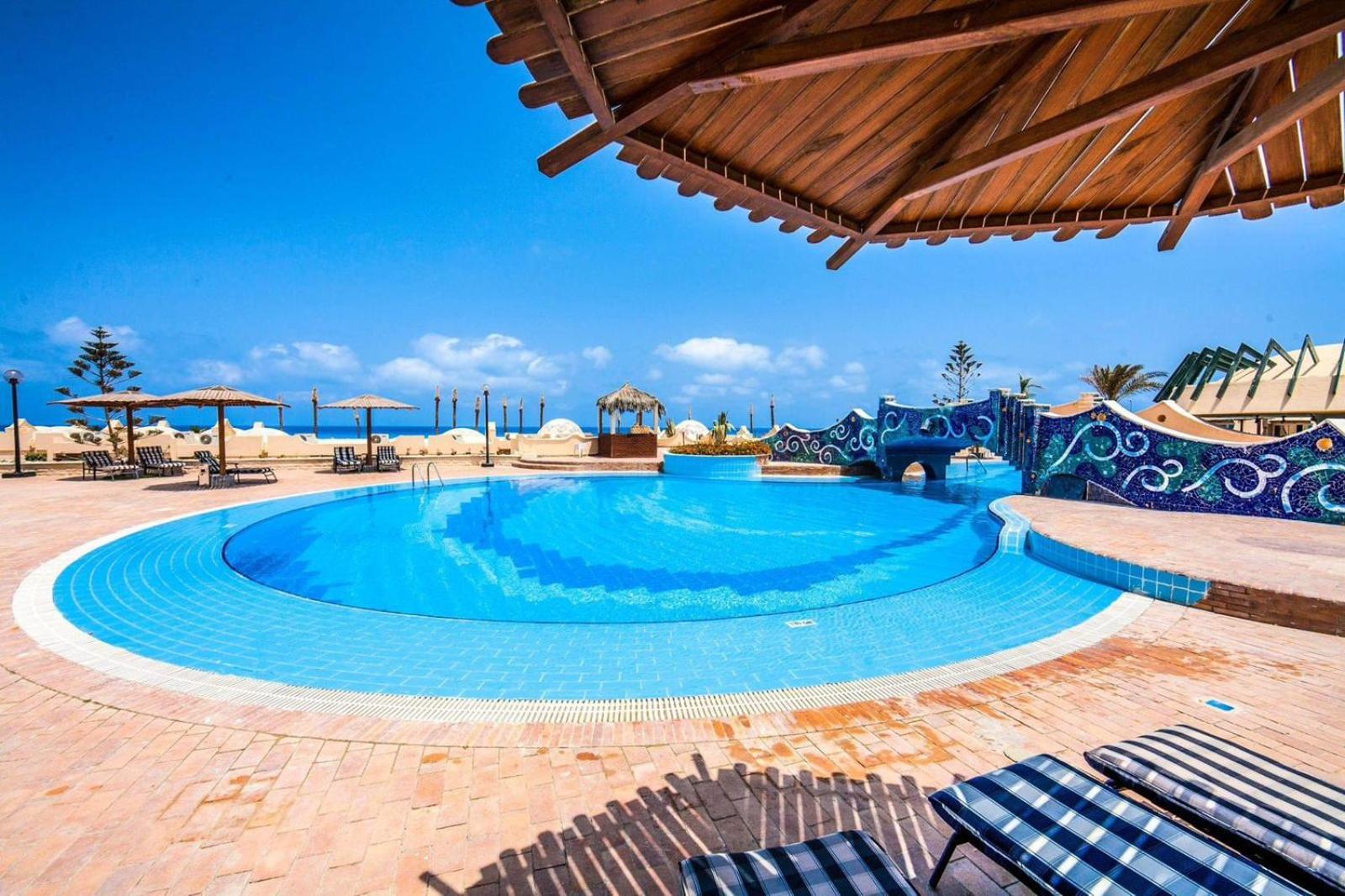Borg El Arab Beach Resort Exterior foto The swimming pool at the hotel